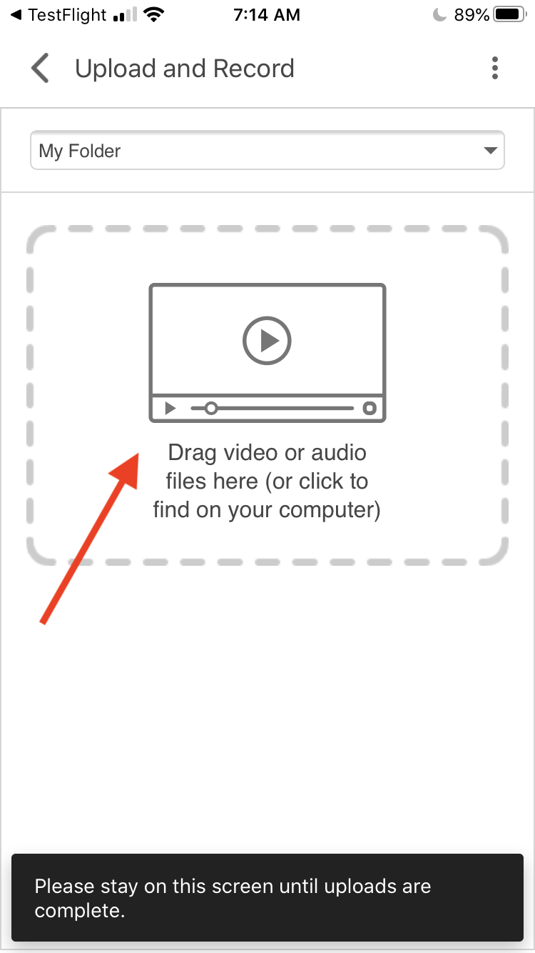 A screenshot of the upload screen in the iOS Panopto app. The screen says 'Drag video or audio files here (or click to find on your computer)' and warns the user to 'stay on this screen until uploads are complete'.