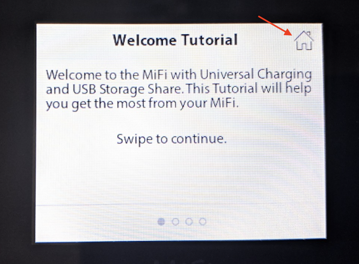 Image of MiFi Welcome Tutorial screen with a red arrow pointing to the Home button.