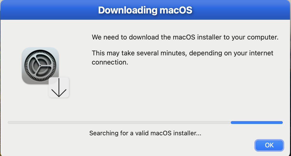 Downloading macOS dialog showing installer search progress